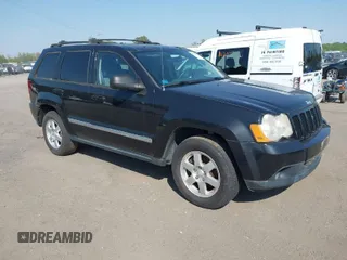 2010 Jeep Grand Cherokee Laredo with VIN 1J4PR4GK5AC120373, listed as a IAAI auction lot 42071835 with 101,949 mi miles. Bid and sale history available at carsss.com. Image 1.