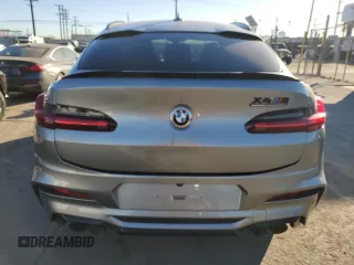 2020 BMW X4 M Competition z VIN 5YMUJ0C02L9C47802, wystawiony jako Copart lot #88896685 z przebiegiem Nie podano mil oraz Szkody całkowita. Historia ofert i sprzedaży dostępna na DreamBid. Obrazek 6.