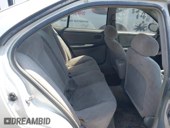 1999 Nissan Altima XE with VIN 1N4DL01D7XC181770, listed as a IAAI auction lot 41747919 with 197,601 mi miles. Bid and sale history available at carsss.com. Image 8.