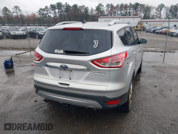 2016 Ford Escape Titanium with VIN 1FMCU0JX7GUB25573, listed as a IAAI auction lot 41871980 with 157,525 mi miles. Bid and sale history available at carsss.com. Image 4.