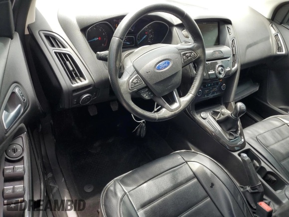 2015 Ford Focus Titanium z VIN 1FADP3N28FL239706, wystawiony jako Copart lot #62478895 z przebiegiem 143 536 mil mil oraz Szkoda całkowita • Salvage title. Historia ofert i sprzedaży dostępna na DreamBid. Obrazek 8.