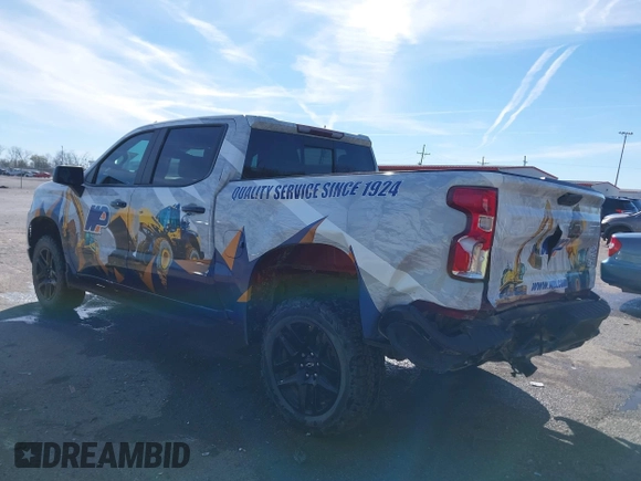2023 Chevrolet Silverado 1500 LT Trail Boss with VIN 3GCUDFED3PG197885, listed as a IAAI auction lot 41733427 with 64,911 mi miles and . Bid and sale history available at DreamBid. Image 3.