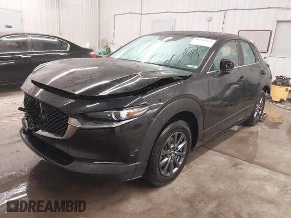 2021 Mazda CX-30 S with VIN 3MVDMBAL2MM265207, listed as a IAAI auction lot 41566325 with 62,587 mi miles and . Bid and sale history available at carsss.com. Image 18.