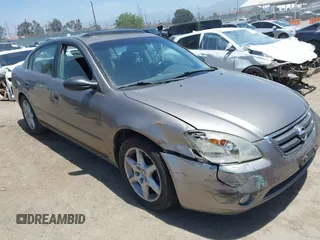 2003 Nissan Altima SE z VIN 1N4BL11D93C300023, wystawiony jako IAAI lot #42339211 z przebiegiem 118 871 mil mil oraz . Historia ofert i sprzedaży dostępna na DreamBid. Obrazek 1.