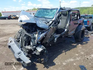 2018 Jeep Wrangler Unlimited Sport S z VIN 1C4HJXDG9JW150509, wystawiony jako IAAI lot #41989409 z przebiegiem Nie podano mil oraz . Historia ofert i sprzedaży dostępna na DreamBid. Obrazek 18.