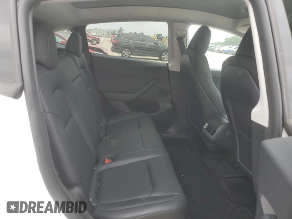 2023 Tesla Model Y Long Range z VIN 7SAYGDEE0PF802511, wystawiony jako Copart lot #54959415 z przebiegiem 12 902 mil mil oraz Szkoda całkowita • Salvage title. Historia ofert i sprzedaży dostępna na DreamBid. Obrazek 10.