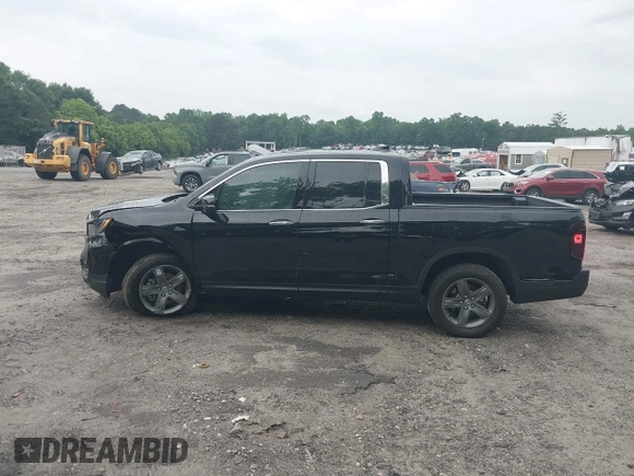 2023 Honda Ridgeline RTL-E with VIN 5FPYK3F77PB052828, listed as a IAAI auction lot 42366947 with 24,658 mi miles and . Bid and sale history available at DreamBid. Image 14.