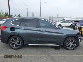 2016 BMW X1 xDrive28i with VIN WBXHT3C32GP886084, listed as a IAAI auction lot 41895754 with 85,662 mi miles and . Bid and sale history available at DreamBid. Image 18.