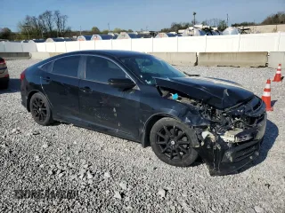 2017 Honda Civic LX with VIN 19XFC2F50HE025046, listed as a Copart auction lot 54244525 with 220,145 mi miles and Salvage Title. Bid and sale history available at DreamBid. Image 4.