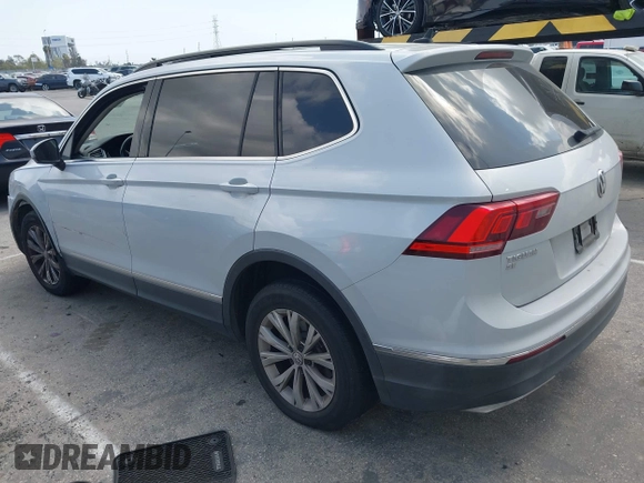 2018 Volkswagen Tiguan SEL with VIN 3VV2B7AX8JM105246, listed as a IAAI auction lot 41906838 with 110,749 mi miles and . Bid and sale history available at DreamBid. Image 3.