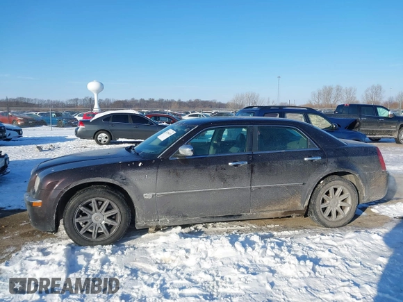 2005 Chrysler 300 with VIN 2C3AA63H65H526016, listed as a IAAI auction lot 41296420 with 136,794 mi miles. Bid and sale history available at carsss.com. Image 14.
