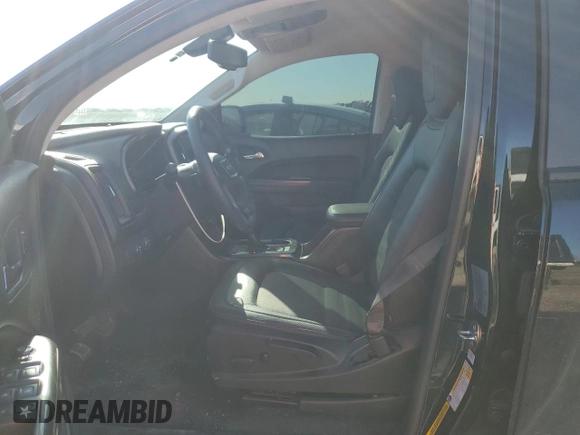 2021 GMC Canyon 4WD AT4 w/Leather with VIN 1GTG6FEN3M1274409, listed as a Copart auction lot 42502355 with 57,194 mi miles and Salvage Title. Bid and sale history available at carsss.com. Image 7.