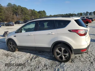 2017 Ford Escape SE with VIN 1FMCU0GD6HUB48986, listed as a Copart auction lot 43915415 with 122,465 mi miles and Salvage Title. Bid and sale history available at DreamBid. Image 2.