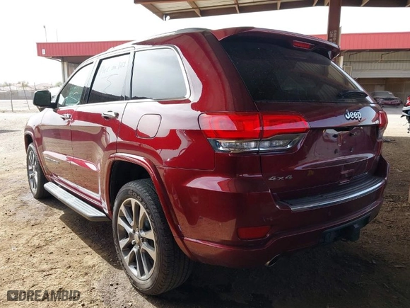 2018 Jeep Grand Cherokee Overland with VIN 1C4RJFCG1JC173042, listed as a IAAI auction lot 41705160 with 64,949 mi miles. Bid and sale history available at carsss.com. Image 3.