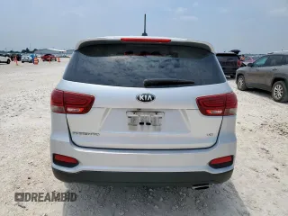2019 Kia Sorento LX z VIN 5XYPG4A5XKG558737, wystawiony jako Copart lot #56864265 z przebiegiem 99 633 mil mil oraz Czysty tytuł • Clean title. Historia ofert i sprzedaży dostępna na DreamBid. Obrazek 6.