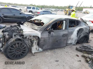 2016 Porsche Panamera 4 z VIN WP0AA2A78GL006176, wystawiony jako IAAI lot #41987545 z przebiegiem Nie podano mil oraz . Historia ofert i sprzedaży dostępna na DreamBid. Obrazek 2.