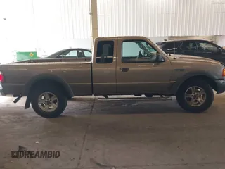 2003 Ford Ranger XL Fleet with VIN 1FTZR45E93PB01008, listed as a IAAI auction lot 41889570 with 197,493 mi miles and . Bid and sale history available at carsss.com. Image 13.