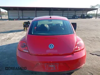 2013 Volkswagen Beetle Fender Edition z VIN 3VWJP7AT8DM674981, wystawiony jako IAAI lot #41685176 z przebiegiem 65 283 mil mil oraz . Historia ofert i sprzedaży dostępna na DreamBid. Obrazek 17.