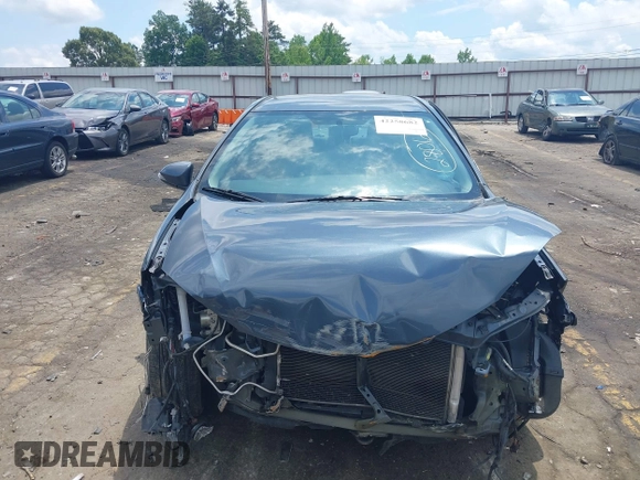 2016 Toyota Corolla L with VIN 2T1BURHE4GC592438, listed as a IAAI auction lot 42258682 with 147,509 mi miles and . Bid and sale history available at DreamBid. Image 12.