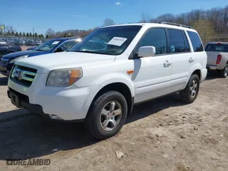 2007 Honda Pilot EX-L with VIN 5FNYF18777B002106, listed as a IAAI auction lot 42060765 with 202,276 mi miles. Bid and sale history available at carsss.com. Image 2.