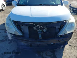 2009 Nissan Versa S with VIN 3N1BC11E19L394465, listed as a IAAI auction lot 41346553 with 159,983 mi miles and . Bid and sale history available at DreamBid. Image 6.