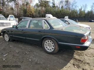 1998 Jaguar XJ with VIN SAJHX1241WC839104, listed as a Copart auction lot 81911744 with 61,956 mi miles and Clean Title. Bid and sale history available at carsss.com. Image 2.
