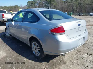 2008 Ford Focus SE with VIN 1FAHP33N48W114038, listed as a IAAI auction lot 41533744 with 143,065 mi miles. Bid and sale history available at carsss.com. Image 3.