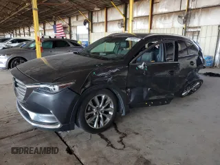 2016 Mazda CX-9 Grand Touring with VIN JM3TCADY3G0119947, listed as a Copart auction lot 57904515 with 94,251 mi miles and Salvage title. Bid and sale history available at DreamBid. Image 1.
