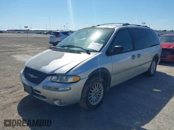 1999 Chrysler Town & Country LXi with VIN 1C4GP54L9XB872347, listed as a IAAI auction lot 41611666 with 224,817 mi miles. Bid and sale history available at carsss.com. Image 2.
