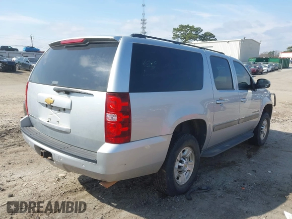 2013 Chevrolet Suburban LS z VIN 1GNWKLEGXDR305591, wystawiony jako IAAI lot #41785334 z przebiegiem 203 613 mil mil oraz . Historia ofert i sprzedaży dostępna na DreamBid. Obrazek 4.