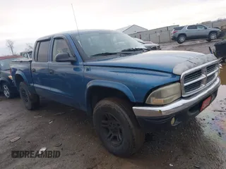 2003 Dodge Dakota SLT with VIN 1D7HG48N43S249020, listed as a IAAI auction lot 41580449 with 240,500 mi miles and . Bid and sale history available at carsss.com. Image 1.