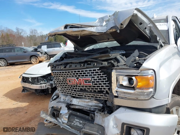 2017 GMC Sierra 2500HD Denali with VIN 1GT12UEY8HF216479, listed as a IAAI auction lot 41678315 with 127,057 mi miles. Bid and sale history available at carsss.com. Image 6.