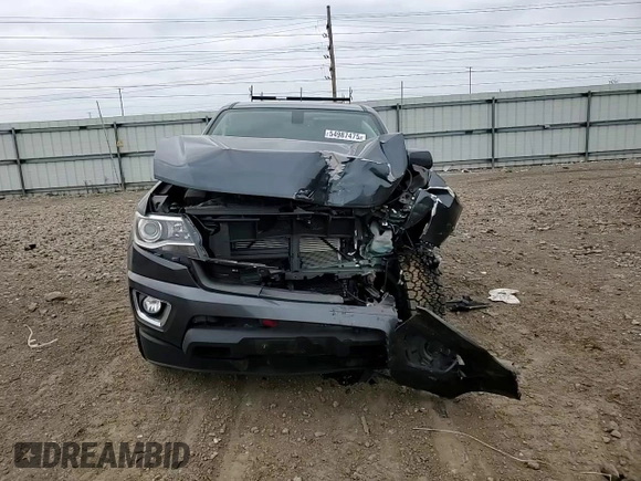 2015 Chevrolet Colorado 4WD Z71 z VIN 1GCGTCE37F1236156, wystawiony jako Copart lot #54987475 z przebiegiem 198 656 mil mil oraz Szkoda całkowita • Salvage title. Historia ofert i sprzedaży dostępna na DreamBid. Obrazek 13.