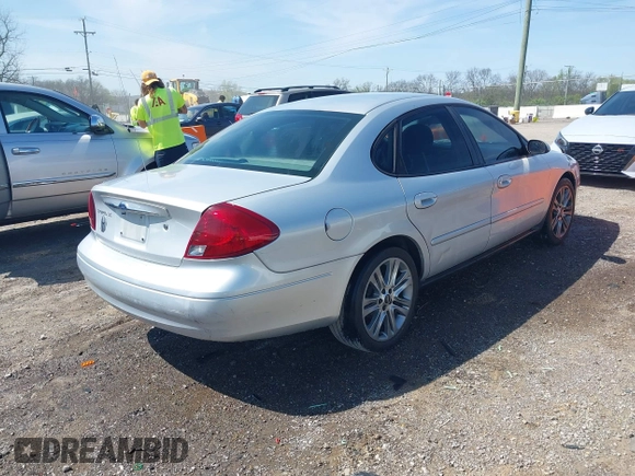 2003 Ford Taurus SE Standard with VIN 1FAFP53U83A166112, listed as a IAAI auction lot 41945480 with 173,593 mi miles. Bid and sale history available at carsss.com. Image 4.