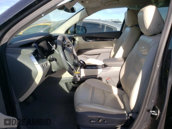 2022 Cadillac XT6 Premium Luxury with VIN 1GYKPCRS9NZ125022, listed as a Copart auction lot 42392485 with 34,703 mi miles and Salvage Title. Bid and sale history available at carsss.com. Image 7.