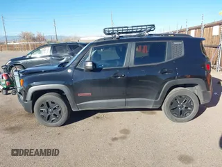 2018 Jeep Renegade Trailhawk with VIN ZACCJBCB4JPJ00887, listed as a IAAI auction lot 40981104 with 99,983 mi miles. Bid and sale history available at carsss.com. Image 14.