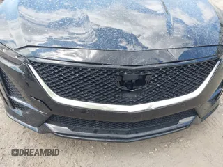 2024 Cadillac CT5 Sport z VIN 1G6DP5RK3R0127081, wystawiony jako IAAI lot #42319697 z przebiegiem 4 093 mil mil oraz . Historia ofert i sprzedaży dostępna na DreamBid. Obrazek 18.