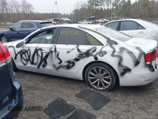 2012 Audi A8 с VIN WAUAVAFD9CN025571, выставлен на аукционе IAAI как лот 41919518 с пробегом 134 341 миль миль и . История ставок и продаж доступна на DreamBid. Изображение 14.