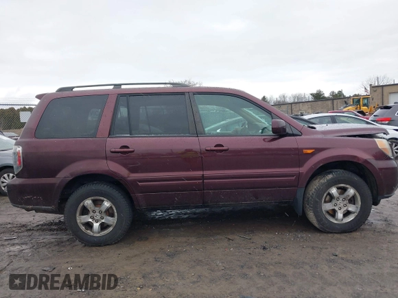 2007 Honda Pilot EX-L with VIN 2HKYF18557H535426, listed as a IAAI auction lot 41126160 with 169,336 mi miles. Bid and sale history available at carsss.com. Image 13.