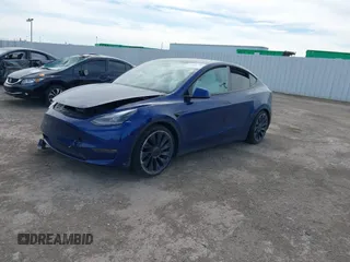2021 Tesla Model Y Performance z VIN 5YJYGDEF8MF245641, wystawiony jako IAAI lot #41685230 z przebiegiem 25 903 mil mil oraz . Historia ofert i sprzedaży dostępna na DreamBid. Obrazek 2.