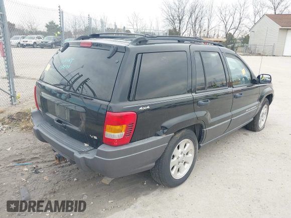 2001 Jeep Grand Cherokee Laredo with VIN 1J4GW48N91C644952, listed as a IAAI auction lot 40825099 with Not provided miles and . Bid and sale history available at DreamBid. Image 4.