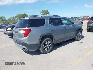 2023 GMC Acadia SLT with VIN 1GKKNML46PZ130813, listed as a IAAI auction lot 42614040 with 56,086 mi miles and . Bid and sale history available at DreamBid. Image 4.