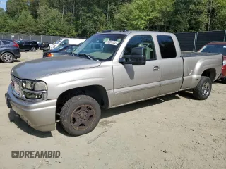 2003 GMC Sierra Denali z VIN 2GTFK69U831201215, wystawiony jako Copart lot #73801184 z przebiegiem 186 959 mil mil oraz Szkody całkowita. Historia ofert i sprzedaży dostępna na DreamBid. Obrazek 1.