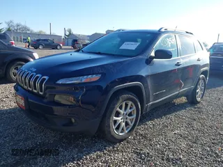 2015 Jeep Cherokee Latitude with VIN 1C4PJMCB1FW709560, listed as a IAAI auction lot 42035619 with 162,354 mi miles. Bid and sale history available at carsss.com. Image 2.