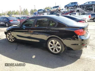 2014 BMW 3 Series 335i xDrive with VIN WBA3B9G53ENR90601, listed as a Copart auction lot 48493275 with 129,992 mi miles and Salvage Title. Bid and sale history available at carsss.com. Image 2.