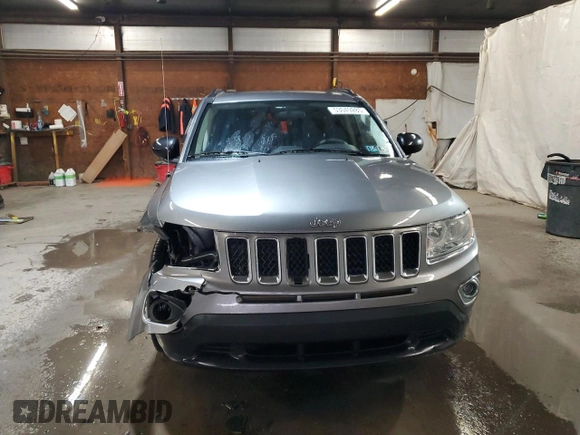 2011 Jeep Compass Latitude with VIN 1J4NF1FB9BD207804, listed as a Copart auction lot 53049285 with 168,163 mi miles and Salvage Title. Bid and sale history available at carsss.com. Image 5.