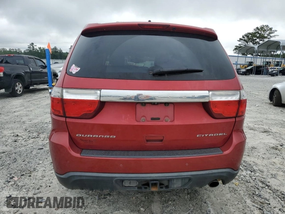 2011 Dodge Durango Citadel с VIN 1D4RD5GG4BC694823, выставлен на аукционе Copart как лот 61083015 с пробегом 178 640 миль миль и Списание • Salvage title. История ставок и продаж доступна на DreamBid. Изображение 6.