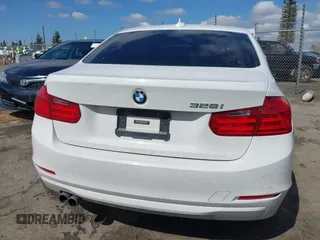 2015 BMW 3 Series 328i with VIN WBA3C1C5XFK117788, listed as a IAAI auction lot 41752178 with 154,030 mi miles and . Bid and sale history available at carsss.com. Image 16.