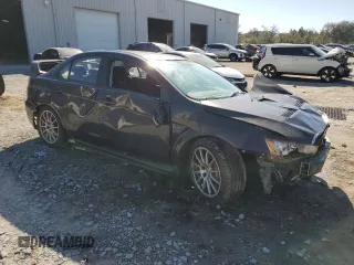 2015 Mitsubishi Lancer Evolution GSR with VIN JA32W8FV8FU023812, listed as a Copart auction lot 48822935 with 105,463 mi miles and Salvage Title. Bid and sale history available at carsss.com. Image 4.