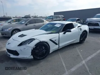 2014 Chevrolet Corvette 1LT z VIN 1G1YB2D72E5123317, wystawiony jako IAAI lot #42403964 z przebiegiem 36 113 mil mil oraz . Historia ofert i sprzedaży dostępna na DreamBid. Obrazek 2.